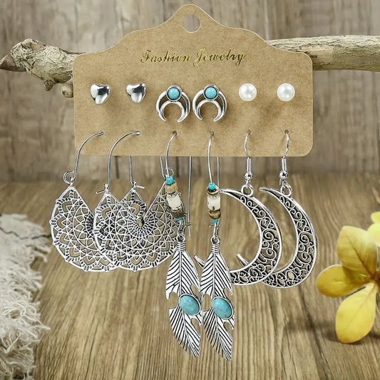 Set 6 Earrings. 3 Dangling and 3 stud.