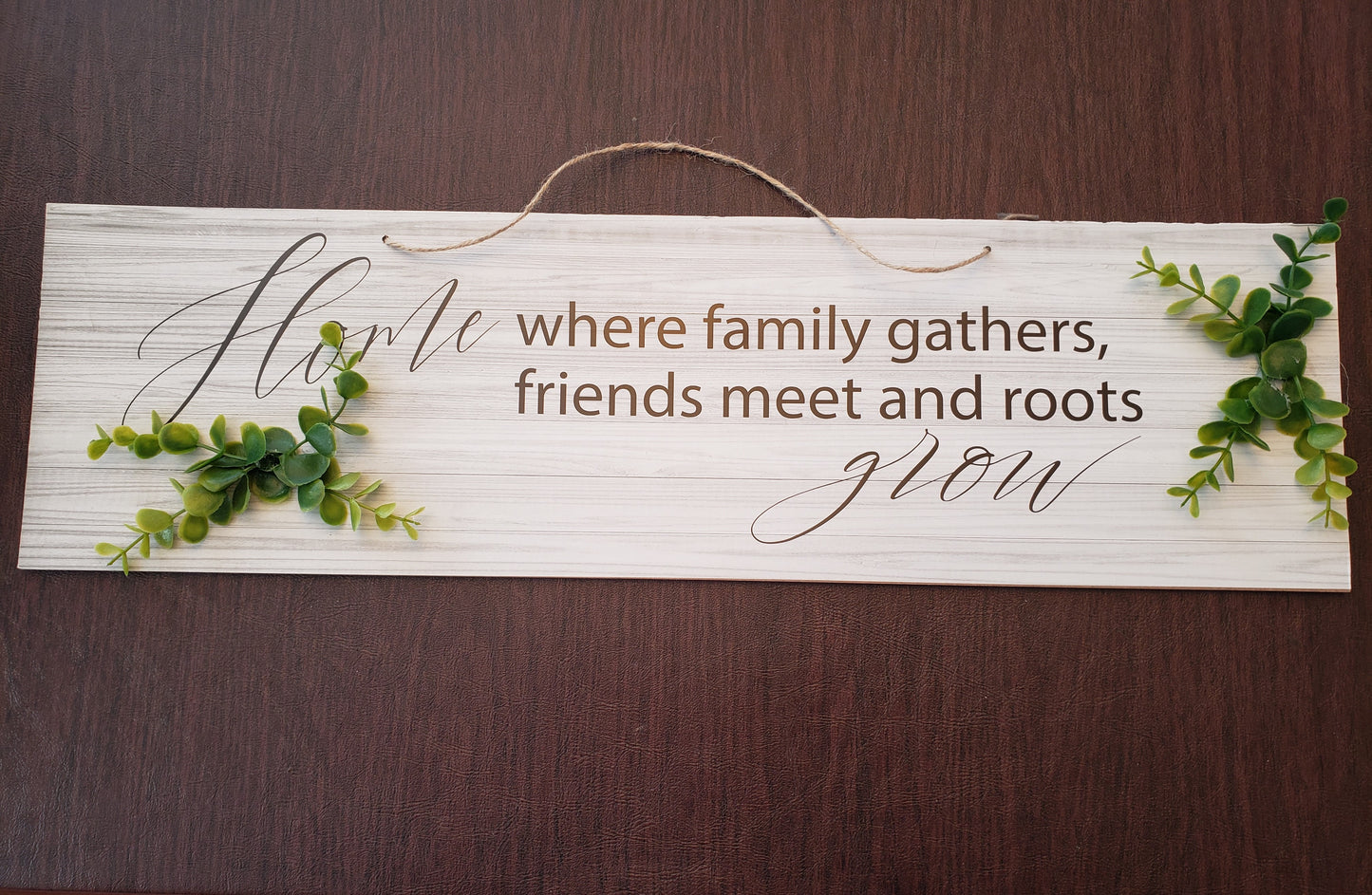 Hanging Door Sign Home where family gathers, friends meet and roots grow. 3d leaves